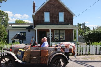 John Butte and his wife Carmen in the Silver Streak in front of the museum in the same spot it sat 80 years ago